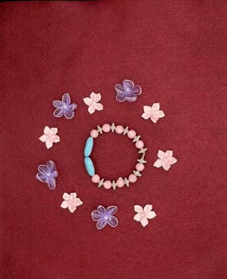 Whimsical Pink Beaded Bracelet with Turquoise Accents & Silver Spacers